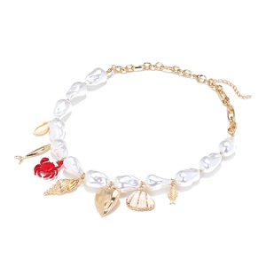 Baroque pearl necklace with gold ocean charms, red crab, and heart pendant for women