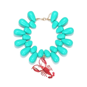 Summer ocean turquoise bead necklace with a vibrant red lobster pendant and gold clasp