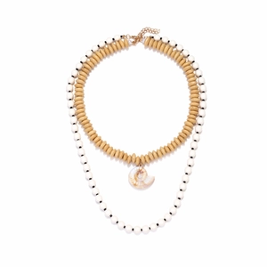 Bohemian layered necklace with wooden beads and a natural seashell pendant on white background