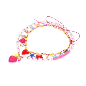 Bohemian layered beaded necklace with starfish heart and crab charms for vacation style