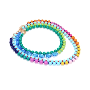 Multi-layer colorful gradient bead necklace with cascading rainbow resin beads and gold clasp