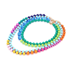 Multilayer rainbow beaded necklace with vibrant gradient colors and a golden clasp