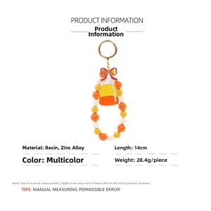 Detailed Halloween candy corn keychain with resin beads and gold zinc alloy ring