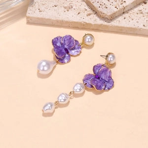 Asymmetric purple enamel flower earrings with baroque pearls and gold accents