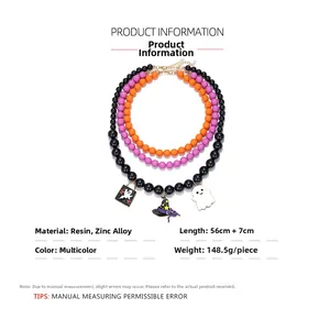 Detail of multi-layer Halloween necklace with resin beads and ghost pendant charms