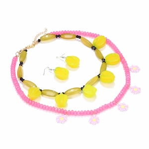 Colorful starfruit and daisy layered necklace set with vibrant beads and matching earrings
