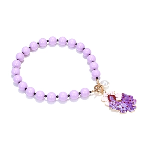 Bohemian style lavender beaded necklace with white floral pendant and golden OT clasp