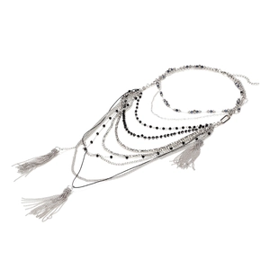Multilayer silver beaded fringe necklace with blue and black crystals on white background