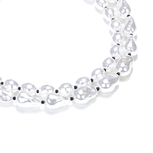 Close-up of double-layer baroque pearl necklace with elegant black spacer beads