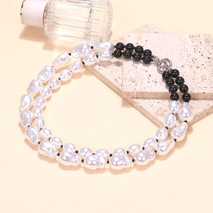 Double-layer baroque pearl necklace with black beads and silver OT clasp on stone