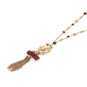 Vintage gold bird pendant necklace with red gemstones and tassel fringe decoration