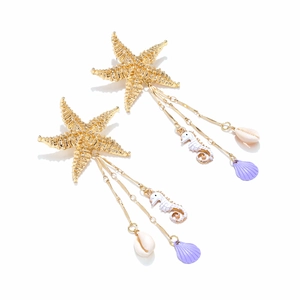 Gold starfish and seahorse drop earrings with shell charms in a coastal vacation style