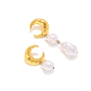 Asymmetric gold crescent moon and baroque pearl drop earrings for women on white background