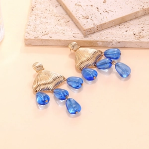 Handmade beaded fishtail drop earrings with blue crystal charms and gold alloy texture