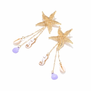 Golden starfish and seahorse tassel earrings featuring natural sea shells for beach vacation