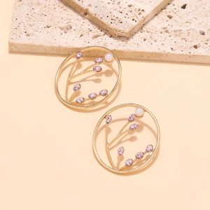 Vintage gold branch earrings with purple crystals and white pearl accents for women