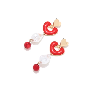Baroque pearl earrings with red enamel heart pendants and golden metal accents
