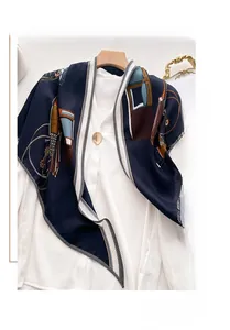 Detailed view of luxury velvet scarf with retro equestrian carriage print and navy patterns