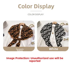 Detail view of mustard and white velvet scarves with geometric prints on white clothes