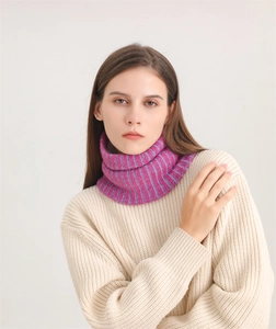Close-up of purple and magenta ribbed knit snood showing warm textured vertical stripes