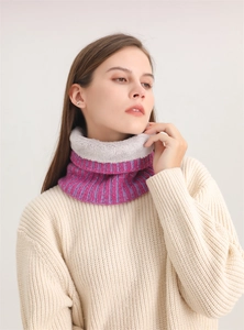 Detail of chunky ribbed knit neck warmer with thick grey fleece lining for winter warmth