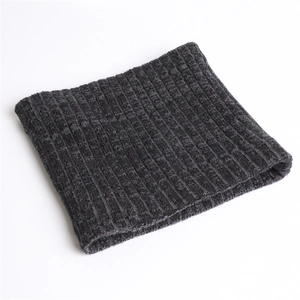 Detailed close-up of dark grey thick ribbed knit neck warmer with soft texture
