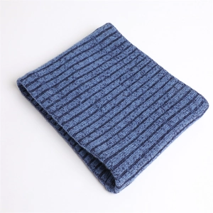 Detail of blue striped rib-knit neck warmer with thick wool texture for winter warmth