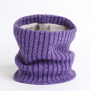 Detail of purple ribbed knit neck warmer with thick grey plush lining for winter warmth