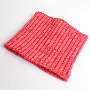Detailed view of heavy-knit red and white ribbed texture on a warm winter neck warmer