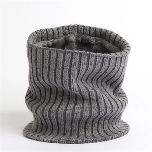 Detail of dark grey ribbed knit neck warmer with thick grey plush lining for winter