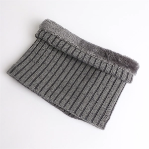 Close-up of gray ribbed knit neck gaiter with thick fleece lining for winter warmth