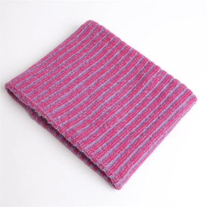 Detail of pink and purple ribbed knit neck warmer with soft white faux fleece lining