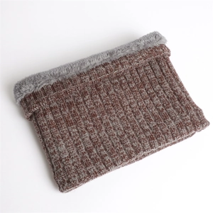 Detail of winter knit neck warmer with thick rib pattern and soft faux fur lining