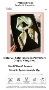 Detail view of the 70cm light green floral silk-like scarf with hand-rolled edges