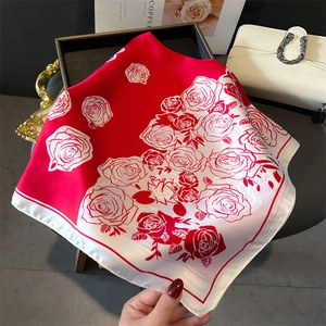 Elegant red silk square scarf with white rose floral print and smooth glossy texture