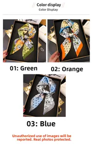 Détail de trois foulards en soie imprimés à fleurs et pois, noués en style nœud papillon