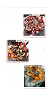 Detail view of ethnic floral print silk scarves showing high-quality hem and texture