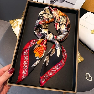 Ethnic floral silk square scarf with vintage patterns on a display tray for women