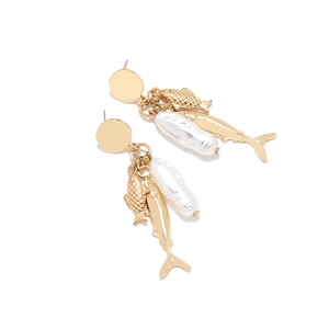 Close-up of gold fish charms and white baroque pearl on long drop earrings