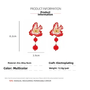 Detailed dimensions of the creative enamel evil eye earrings with red bead accents