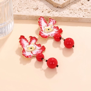 Artistic evil eye earrings with marbled red leaf design and dual red sphere drops