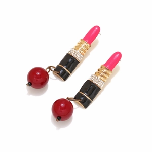 Detailed view of long enamel lipstick earrings with micro-inlaid rhinestones and red beads