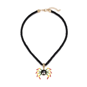 Detail of colorful spider pendant on black woven cord with golden adjustable lobster clasp