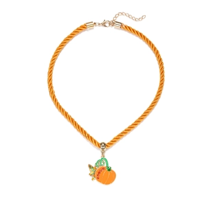 Detail of orange braided rope necklace with enameled pumpkin charm and adjustable lobster clasp