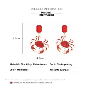 Detailed size specifications for the oversized red crystal crab drop earrings in cm