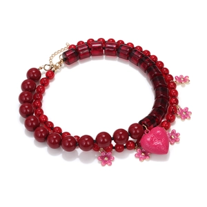 Bohemian double-layered red beaded necklace with pink heart and flower pendants