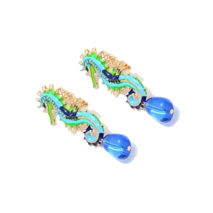 Enamel seahorse drop earrings with blue crystal beads and gold metal accents