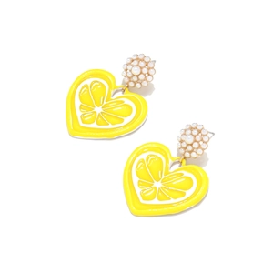 Detail of yellow enamel heart lemon earrings featuring small pearl clusters and alloy drips