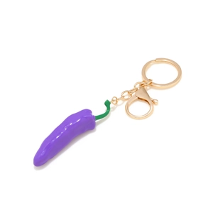 Creative purple chili pendant keychain with shiny enamel finish and golden lobster clasp