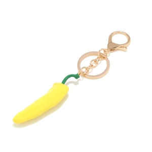 Detail of yellow chili pepper pendant with gold lobster clasp and split key ring